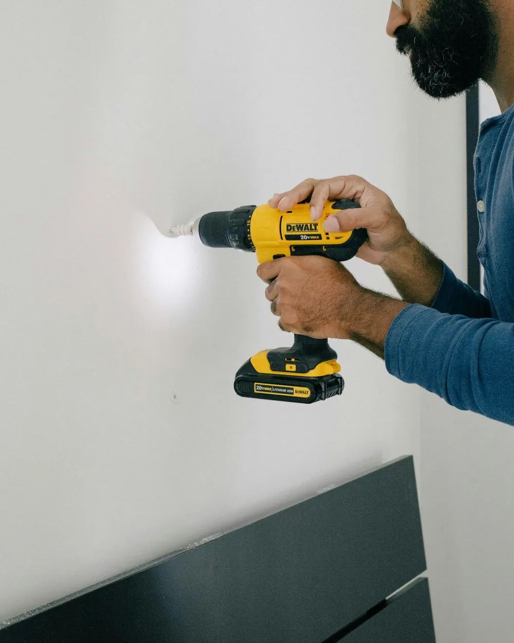 Repair work on an interior wall with a cordless drill